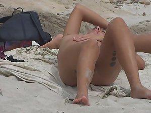 Hot tattooed girl sunbathes nude Picture 1