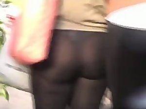 Thong is visible through stretched tights