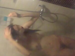 Hairy asian pussy in shower caught by voyeur
