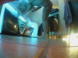 Chubby girl wipes sweat after tanning Picture 5