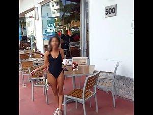 Voyeur checks out a nervous black girl in swimsuit Picture 4