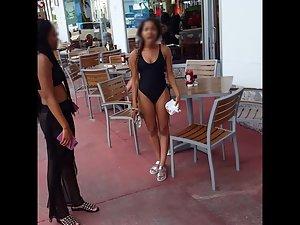 Voyeur checks out a nervous black girl in swimsuit Picture 5