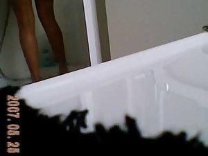 Tanned girl spied in the bathroom Picture 6
