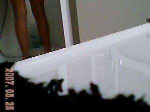 Tanned girl spied in the bathroom Picture 7