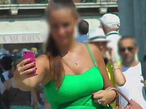 Busty tourist girl does a selfie