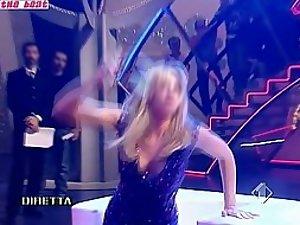 Sexy girl falls down on a television show