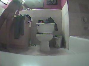 Naked girl finishing her bathroom routine Picture 2
