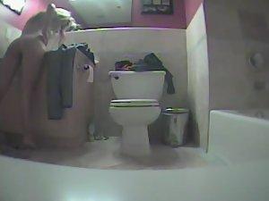 Naked girl finishing her bathroom routine Picture 6