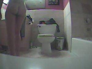 Naked girl finishing her bathroom routine Picture 8