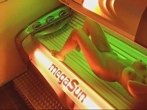 Spying on her nudity as she starts to tan Picture 5