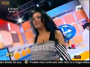 Radiant girl's boobs on the television Picture 2
