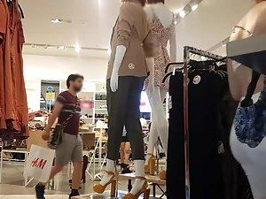Unusual girl in her lacy bra at the shopping mall Picture 1