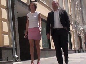 Upskirt of hot woman while a businessman is with her