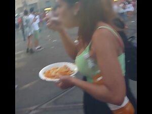 Checking her big tits while she eats at road curb Picture 1