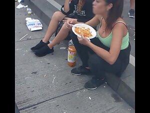 Checking her big tits while she eats at road curb Picture 3