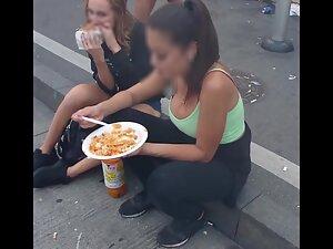 Checking her big tits while she eats at road curb Picture 4