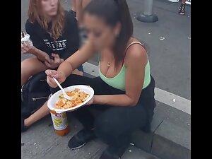 Checking her big tits while she eats at road curb Picture 6