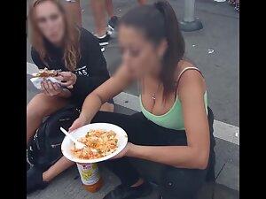 Checking her big tits while she eats at road curb Picture 8