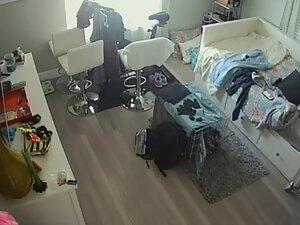Spying on sweet girl changing clothes in her small apartment Picture 4