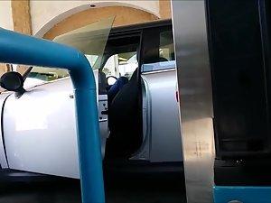 Hot girl fueling her car at a gas station Picture 2