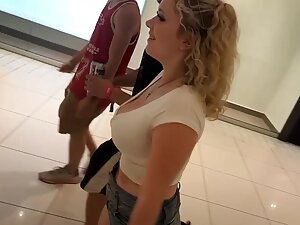 Big boobs of a cute bombastic blonde shorty
