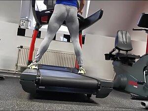 Strong fit woman doing sprints on a treadmill Picture 1