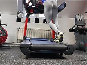 Strong fit woman doing sprints on a treadmill Picture 8
