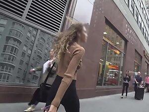 Skinny girl walking through the street Picture 2