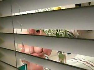 Neighbor's big tits peeped through window Picture 1