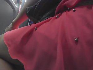 Upskirt of hot woman in red during bus ride Picture 7