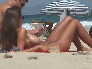 Natural beauty strips nude on beach Picture 6