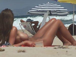 Natural beauty strips nude on beach Picture 7
