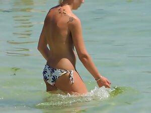 Pointy tits in topless got quickly caught by the voyeur Picture 4