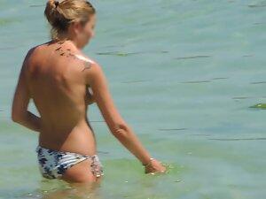 Pointy tits in topless got quickly caught by the voyeur Picture 6