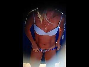 Voyeur peeps on fuckable fit milf in the beach cabin Picture 8