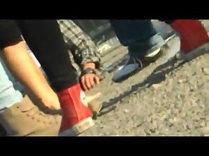 Girl in black tights during a street concert Picture 6