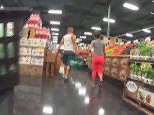 Creeping on fitness couple in supermarket Picture 3