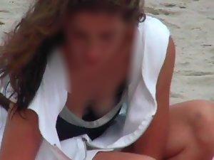 Peeping under a crouching girl's blouse Picture 6