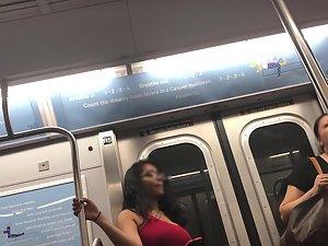 Seductive look of curvy girl in subway train Picture 2