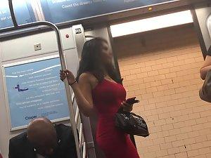 Seductive look of curvy girl in subway train Picture 3