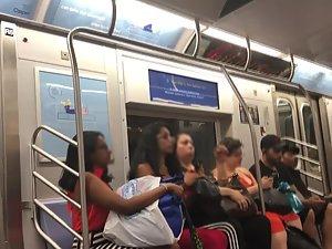 Seductive look of curvy girl in subway train Picture 4