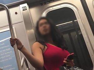 Seductive look of curvy girl in subway train