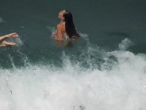 Nudist girls enjoying a long swim Picture 1