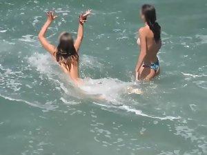 Nudist girls enjoying a long swim Picture 3