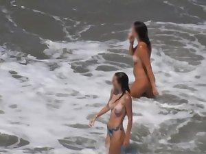 Nudist girls enjoying a long swim Picture 7