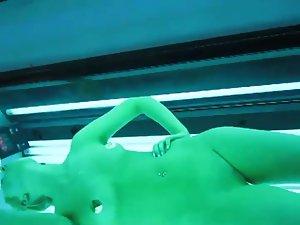 Voyeur got close to her during tanning Picture 2