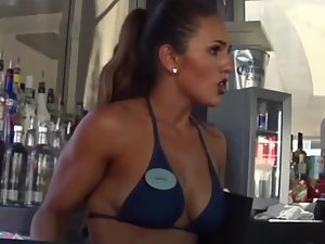 Sexy waitress from the swimming pool bar