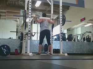 Fit girl squats in the gym Picture 6