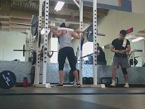 Fit girl squats in the gym Picture 8