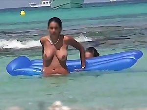 Topless teens having fun in the water Picture 2